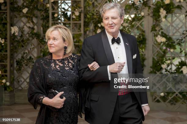 Senator John Kennedy, a Republican from Louisiana, right, and Rebecca Kennedy arrive for a state dinner in honor of French President Emanuel Macron...