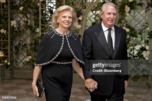 Ginni Rometty, chief executive officer of International Business Machines Corp. , left, and Anthony Mark Rometty arrive for a state dinner in honor...