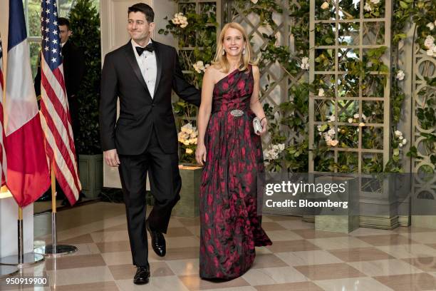 House Speaker Paul Ryan, a Republican from Wisconsin, left, and Janna Ryan arrive for a state dinner in honor of French President Emanuel Macron at...