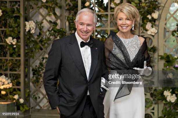 Stephen Schwarzman, co-founder, chairman and chief executive officer of Blackstone Group LP, left, and Christine Schwarzman arrive for a state dinner...