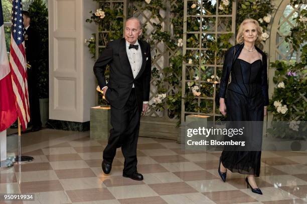 Larry Kudlow, director of the U.S. National Economic Council, left, and Judith Kudlow arrive for a state dinner in honor of French President Emanuel...