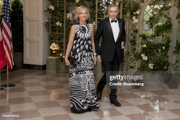 Bernard Arnault, chief executive officer of LVMH Moet Hennessy Louis Vuitton SE, right, and Helene Arnault arrive for a state dinner in honor of...