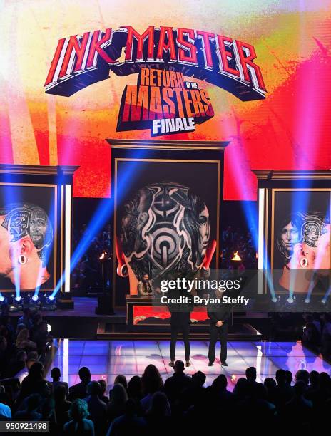 Anthony Michaels and judges Oliver Peck, Dave Navarro and Chris Nunez speak onstage during the Return of the Masters competition phase of the Ink...
