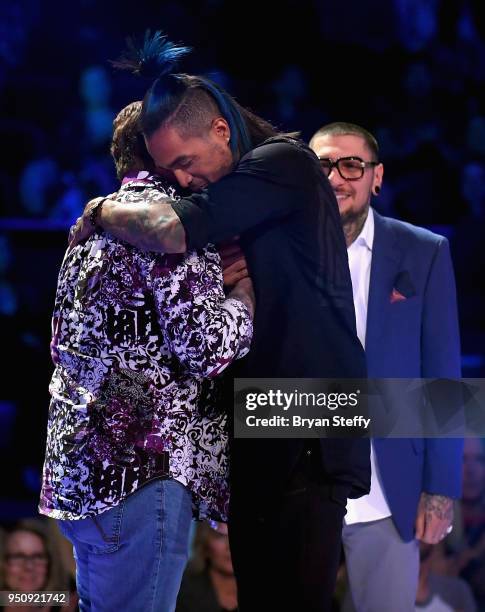 The 3 Return of the Masters finalists Steve Tefft, Anthony Michaels and DJ Tambe stand onstage during the Ink Master Season 10 Finale at the Park...