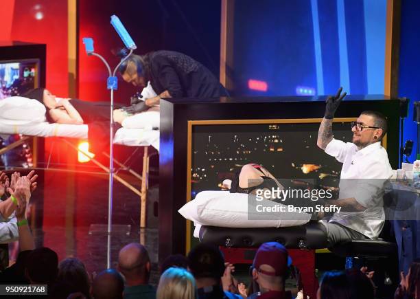 Anthony Michaels and DJ Tambe compete during the Ink Master Season 10 Finale at the Park Theater at Monte Carlo Resort and Casino in Las Vegas on...