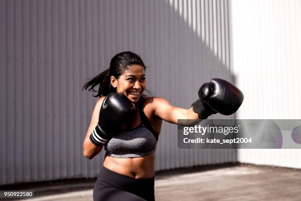 fitness moment - woman fighter stock pictures, royalty-free photos & images