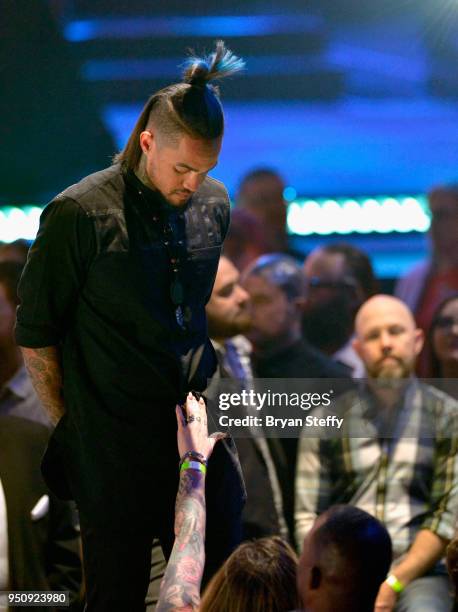 Anthony Michaels stands onstage during the Ink Master Season 10 Finale at the Park Theater at Monte Carlo Resort and Casino in Las Vegas on April 19,...