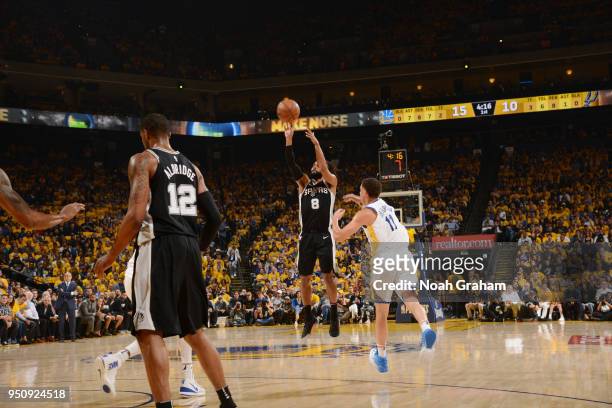Patty Mills of the San Antonio Spurs shoots the ball against the Golden State Warriors Game Five of Round One of the 2018 NBA Playoffs on April 24,...