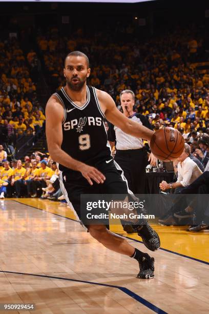 Tony Parker of the San Antonio Spurs handles the ball against the Golden State Warriors in Game Five of Round One of the 2018 NBA Playoffs on April...