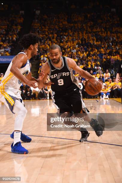 Tony Parker of the San Antonio Spurs handles the ball against the Golden State Warriors in Game Five of Round One of the 2018 NBA Playoffs on April...