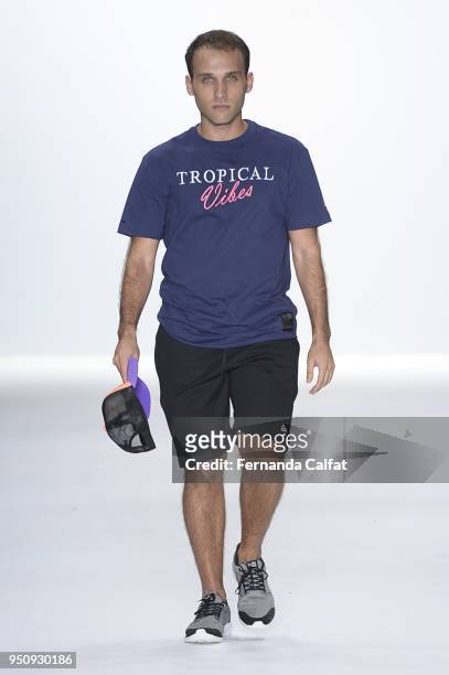 Actor Alex Slama walks at Amir Slama Runway at SPFW N45 Summer 2019 at Ibirapuera's Bienal Pavilion on April 24, 2018 in Sao Paulo, Brazil.