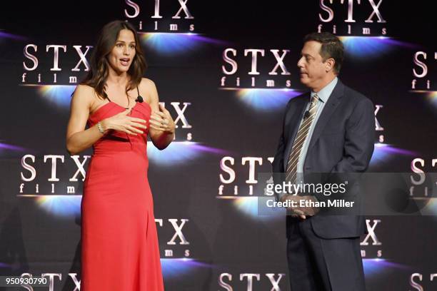 Actor Jennifer Garner and STXfilms Chairman Adam Fogelson speak onstage during the STXfilms presentation at The Colosseum at Caesars Palace during...
