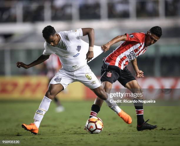 Rodrygo of Santos battles for the ball with Gomez of Estudiantes during the match between Santos and Estudiantes as a part of Copa Libertadores 2018...