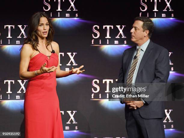 Actor Jennifer Garner and STXfilms Chairman Adam Fogelson speak onstage during the STXfilms presentation at The Colosseum at Caesars Palace during...