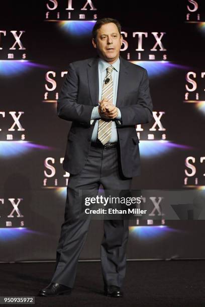 STXfilms Chairman Adam Fogelson speaks onstage during the STXfilms presentation at The Colosseum at Caesars Palace during CinemaCon, the official...