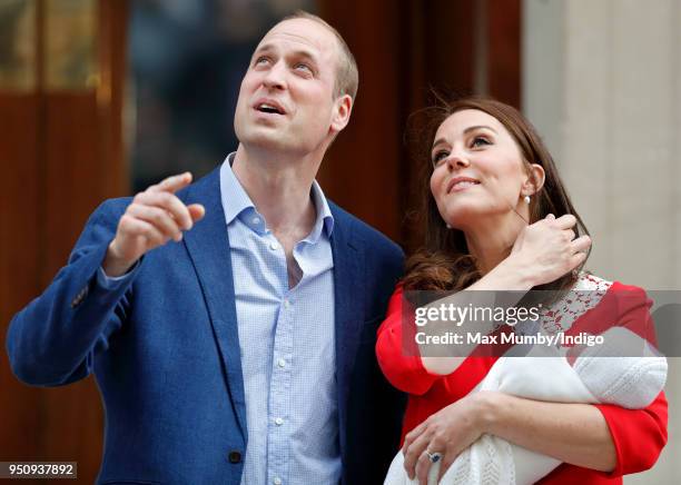 Prince William, Duke of Cambridge and Catherine, Duchess of Cambridge depart the Lindo Wing of St Mary's Hospital with their newborn baby son on...