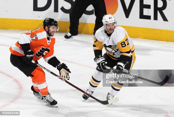 Andrew MacDonald of the Philadelphia Flyers defends Sidney Crosby of the Pittsburgh Penguins in Game Four of the Eastern Conference First Round...