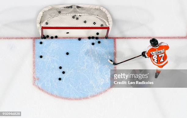 Andrew MacDonald of the Philadelphia Flyers warms up against the Pittsburgh Penguins in Game Four of the Eastern Conference First Round during the...
