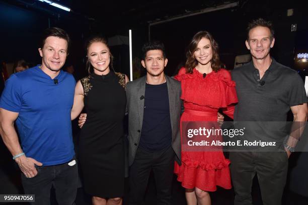 Actors Mark Wahlberg, Ronda Rousey, Iko Uwais, Lauren Cohan and director Peter Berg attend CinemaCon 2018 STXfilms Invites You to an Evening...