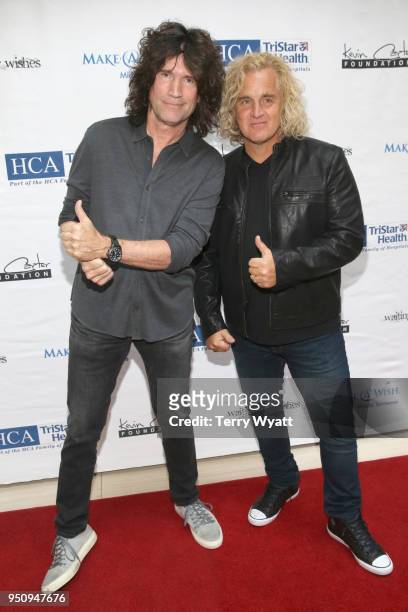 Guitarist Tommy Thayer and artist Jason Scheff attend the 17th annual Waiting for Wishes celebrity dinner at The Palm on April 24, 2018 in Nashville,...