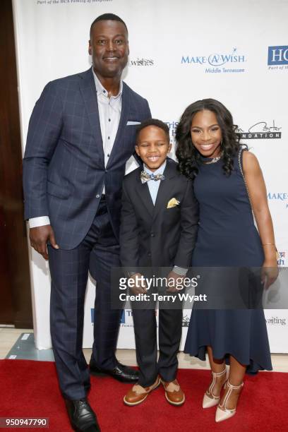Host Kevin Carter, Make-A-Wish child, Kayden, and mother, Brittney, attend the 17th annual Waiting for Wishes celebrity dinner at The Palm on April...