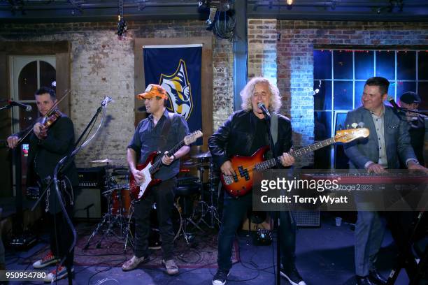 Artists Jason Fitz, Jason Scheff and Jay DeMarcus perform at the 17th annual Waiting for Wishes celebrity dinner at Whiskey Row Nashville on April...