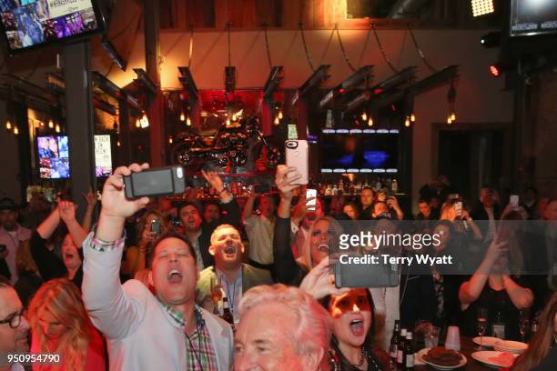 Fans enjoy the performaces onstage during the 17th annual Waiting for Wishes celebrity dinner at Whiskey Row Nashville on April 24, 2018 in...