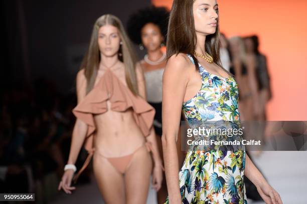 Models walk at Amir Slama Runway at SPFW N45 Summer 2019 at Ibirapuera's Bienal Pavilion on April 24, 2018 in Sao Paulo, Brazil.