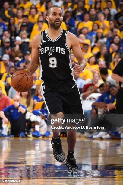 Tony Parker of the San Antonio Spurs handles the ball against the Golden State Warriors in Game Five of Round One of the 2018 NBA Playoffs on April...