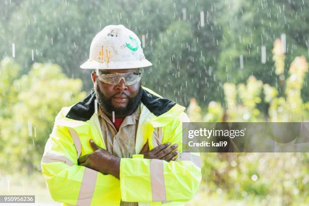 Grumpy Manager Getting Rained On Man Working Rain Photos and Premium High Res Pictures - Getty Images