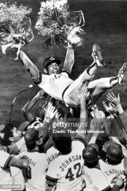 Sachio Kinugasa of Hiroshima Toyo Carp is tossed into the air after his final game against Yakult Swallows at Hiroshima City Stadium on October 15,...