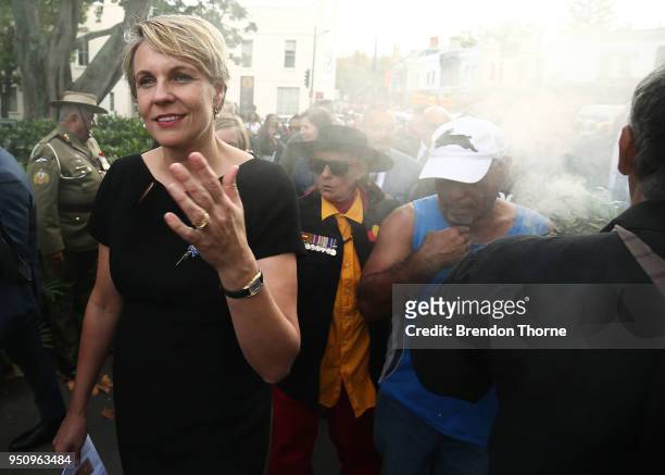 Tanya Plibersek takes part in a smoking ceremony during the Coloured Diggers March on April 25, 2018 in Sydney, Australia. The annual Coloured...