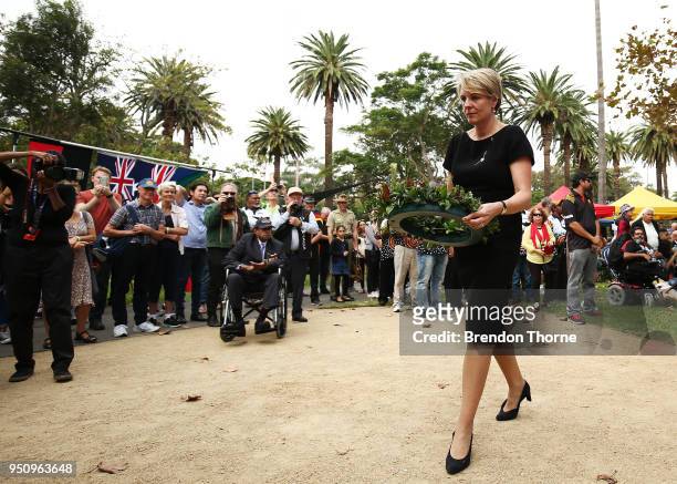 Tanya Plibersek lays a wreath at the Redfern Park World War Memorial during the Coloured Diggers March on April 25, 2018 in Sydney, Australia. The...