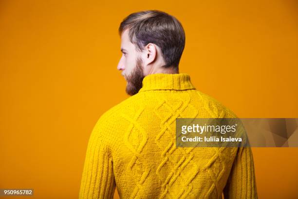 Trendy man in bright sweater