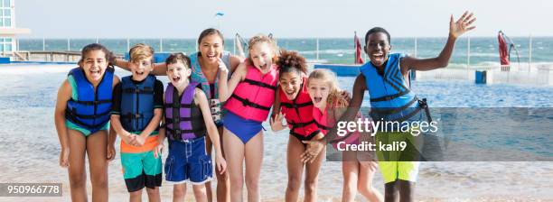 children, teacher on field trip at marine education park - portrait of school children and female teacher in field stock pictures, royalty-free photos & images