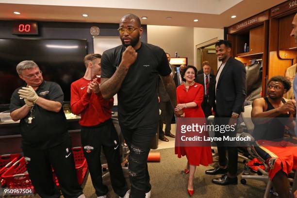 DeMarcus Cousins of the New Orleans Pelicans and Team Owner Gayle Benson of the New Orleans Pelicans walk after the game against the Portland Trail...