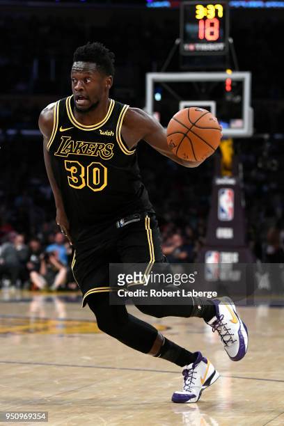 Julius Randle of the Los Angeles Lakers dribbles the ball during the game against the Houston Rockets on April 10, 2018 at STAPLES Center in Los...
