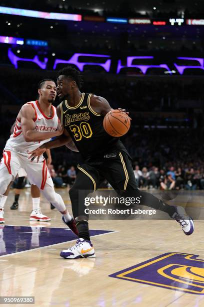 Julius Randle of the Los Angeles Lakers dribbles the ball during the game against the Houston Rockets on April 10, 2018 at STAPLES Center in Los...