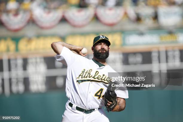 Chris Hatcher of the Oakland Athletics pitches during the game against the Los Angeles Angels of Anaheim at the Oakland Alameda Coliseum on March 29,...