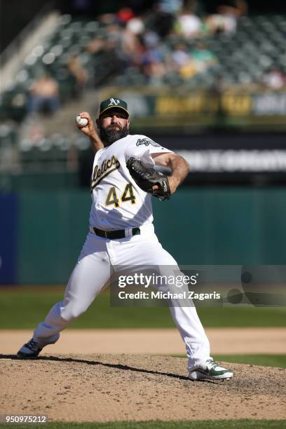 Chris Hatcher of the Oakland Athletics pitches during the game against the Los Angeles Angels of Anaheim at the Oakland Alameda Coliseum on March 29,...