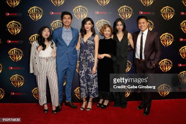 Actress/rapper Awkwafina, actor Henry Golding, actresses Gemma Chan, Constance Wu, Sonoya Mizuno and director Jon M. Chu attend CinemaCon 2018 Warner...