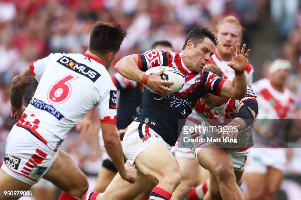 Cooper Cronk of the Roosters makes a break during the round eight NRL match between the St George Illawara Dragons and Sydney Roosters at Allianz...