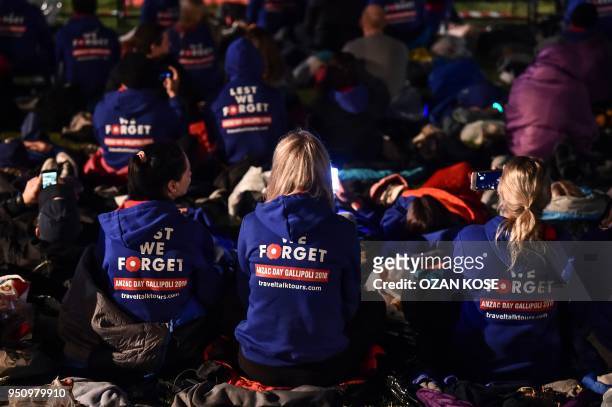 People attend a dawn service marking the 103rd anniversary of ANZAC Day in Canakkale, Turkey on April 25, 2018. - The April 25, 1915 landing of the...