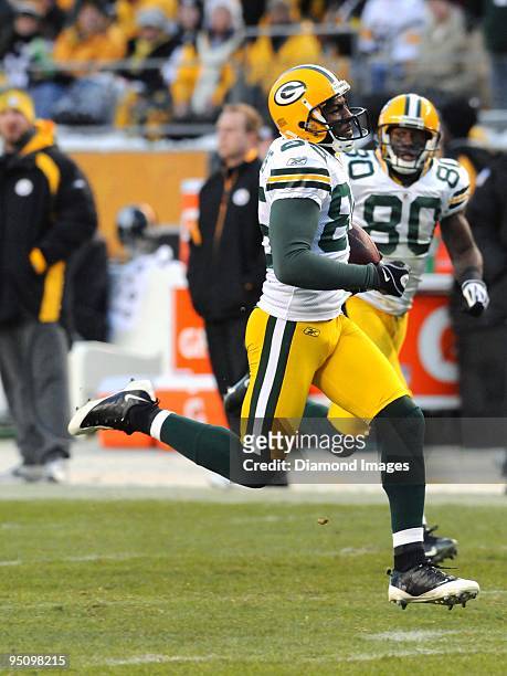Wide receiver Greg Jennings of the Green Bay Packers runs towards the endzone on a 83-yard touchdown pass during a game on December 20, 2009 against...