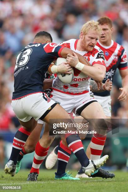 James Graham of the Dragons is tackled during the round eight NRL match between the St George Illawara Dragons and Sydney Roosters at Allianz Stadium...