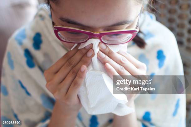 a young woman is having a flu - mucus stock pictures, royalty-free photos & images