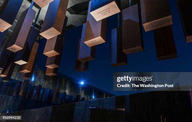 Names and dates of lynching victims are inscribed on corten steel monuments at The National Memorial for Peace and Justice on April 20, 2018 in...