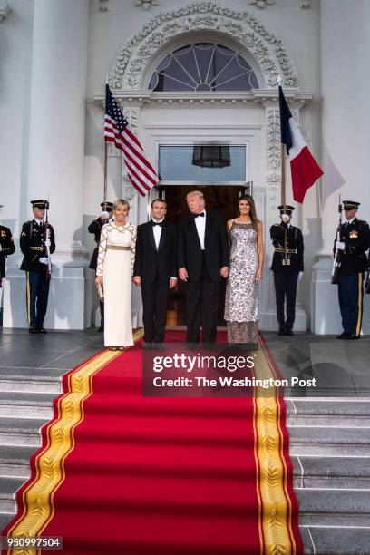 President Donald J. Trump and first lady Melania Trump greet French President Emmanuel Macron and his wife Brigitte Macron at the North Portico as...