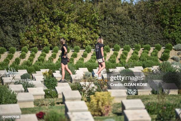 People visit graves during a ceremony marking the 103rd anniversary of ANZAC Day at Lone Pine Cemetery on the Gallipoli penisula, Turkey on April 25,...