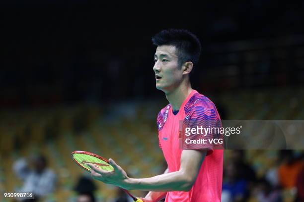 Chen Long of China reacts against Bahaedeen Ahmad Alshannik of Jordan during men's singles first round match on day two of 2018 Badminton Asia...